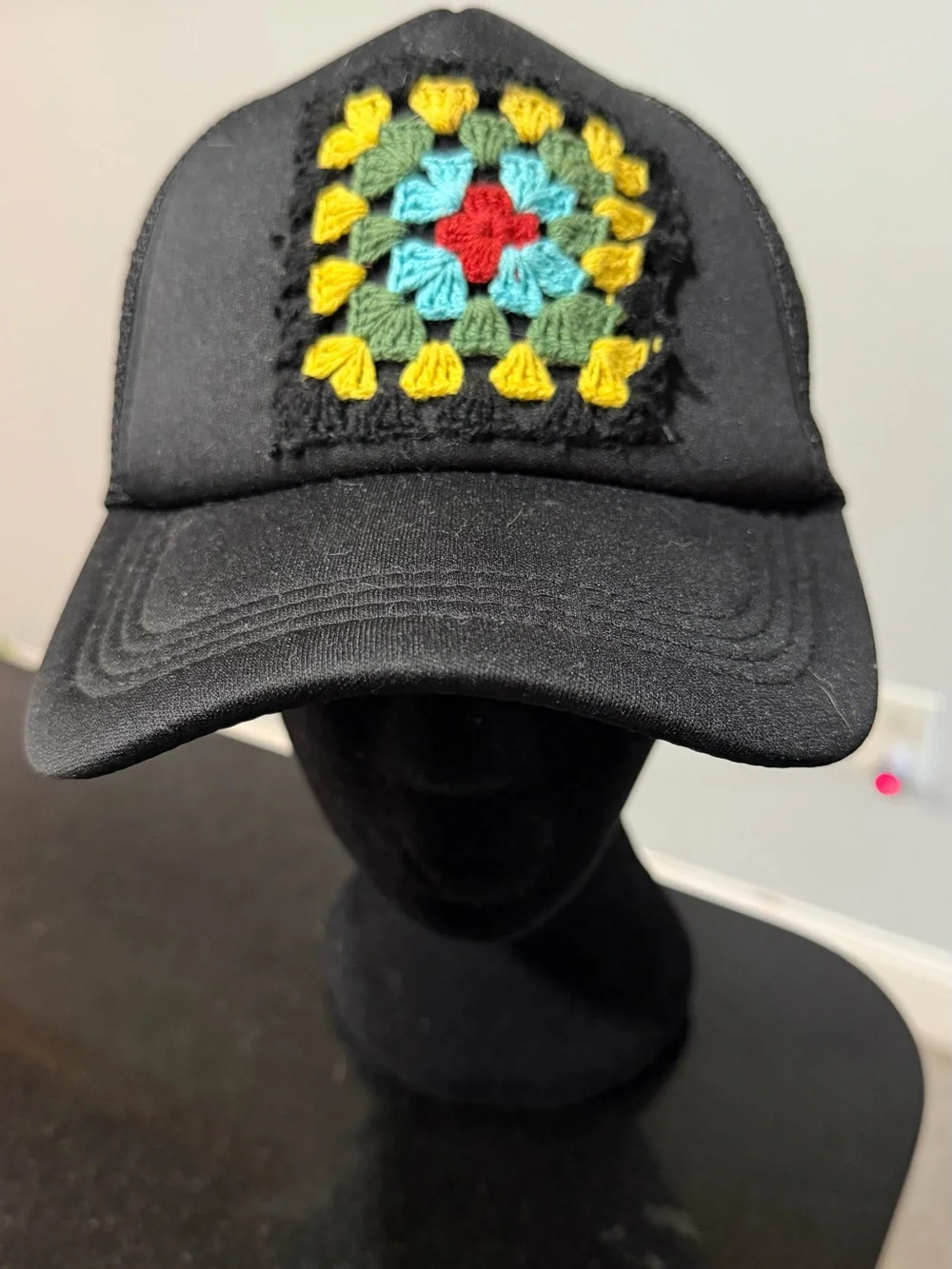 Black Truckers Hat with Crochet Granny Square.